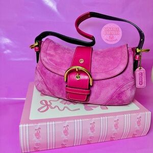 Sold on depop 

 Mini Pink Suede Soho Shoulder Bag Coach ✨